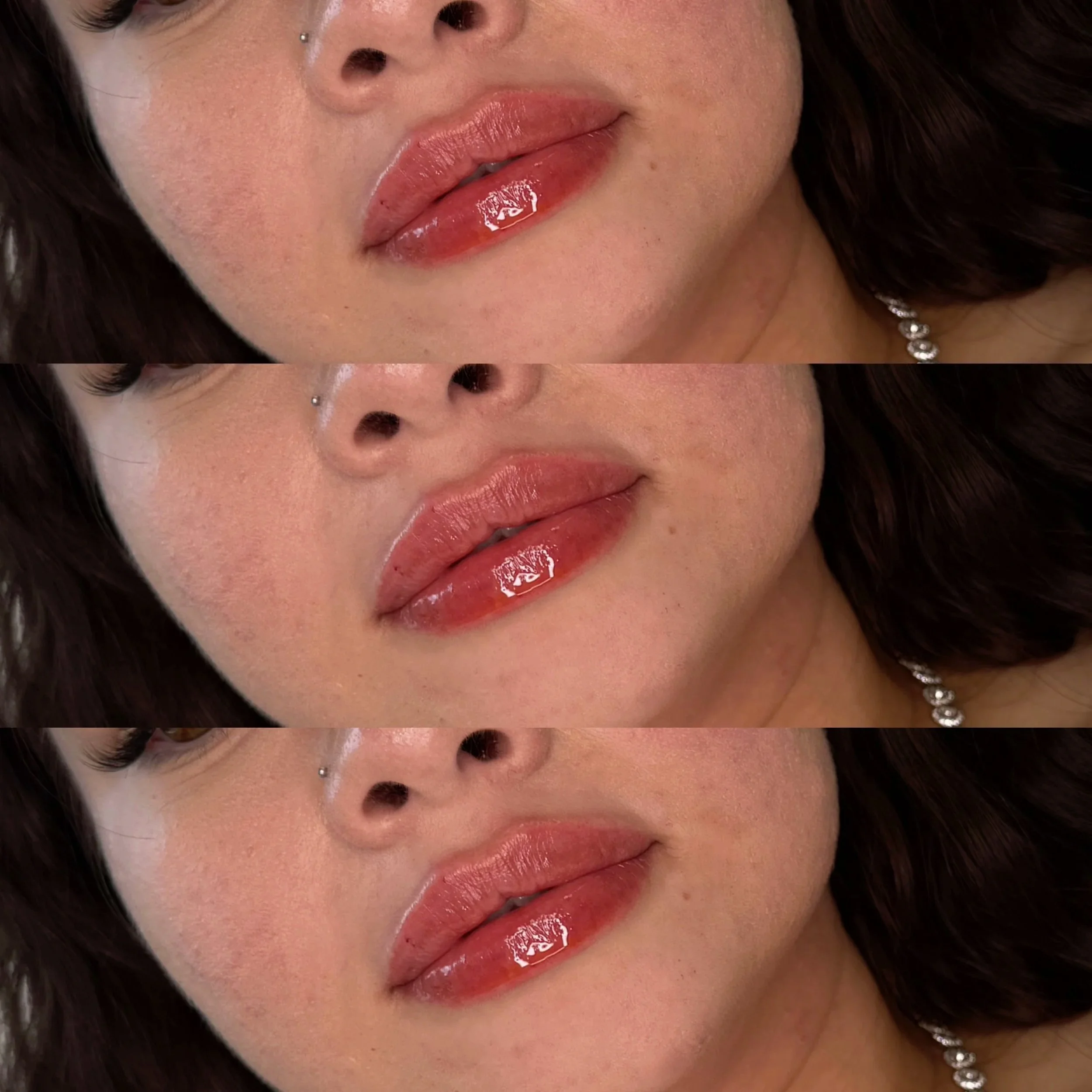 Close-up of a woman's lip filler, wearing glossy lipstick and a necklace with diamonds.
