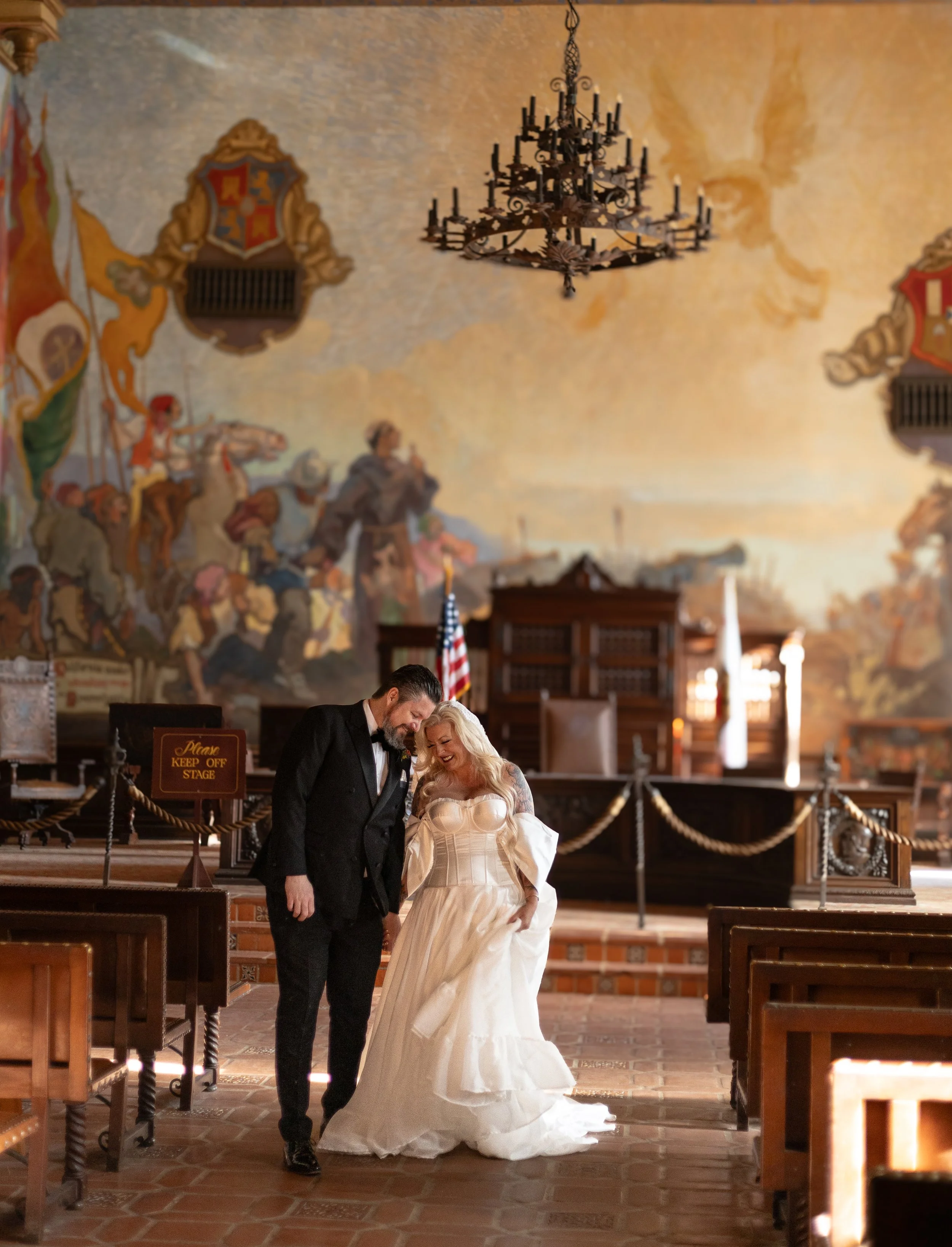 A newlywed couple dressed in Santa Barbara
