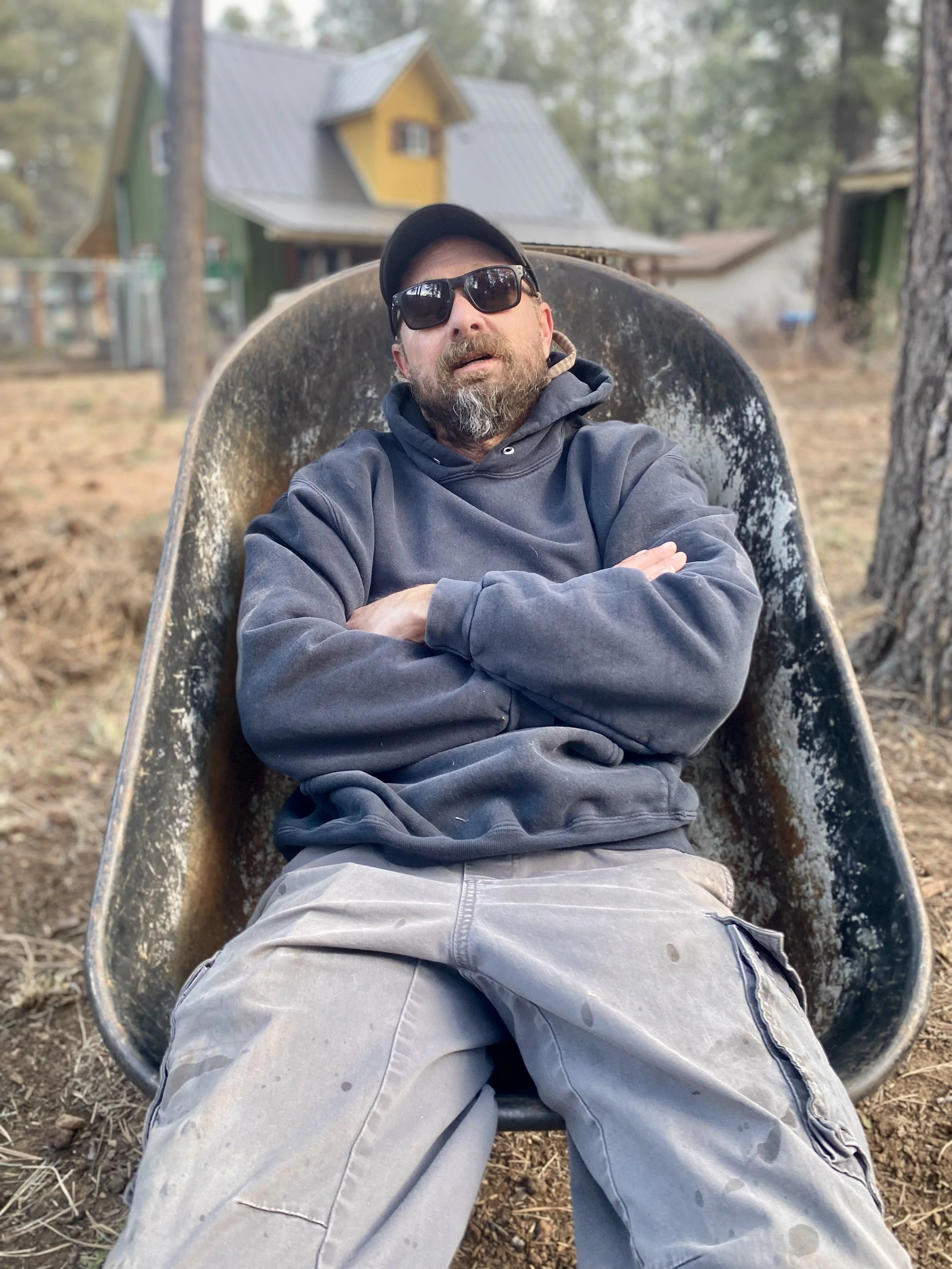 Jones Bros Deviant Designs lifestyle photo featuring casual dark hoodie outdoor style.