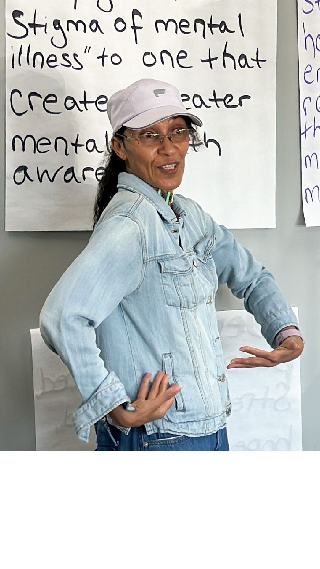 Image of Havalynn giving a presentation on mental health awareness.