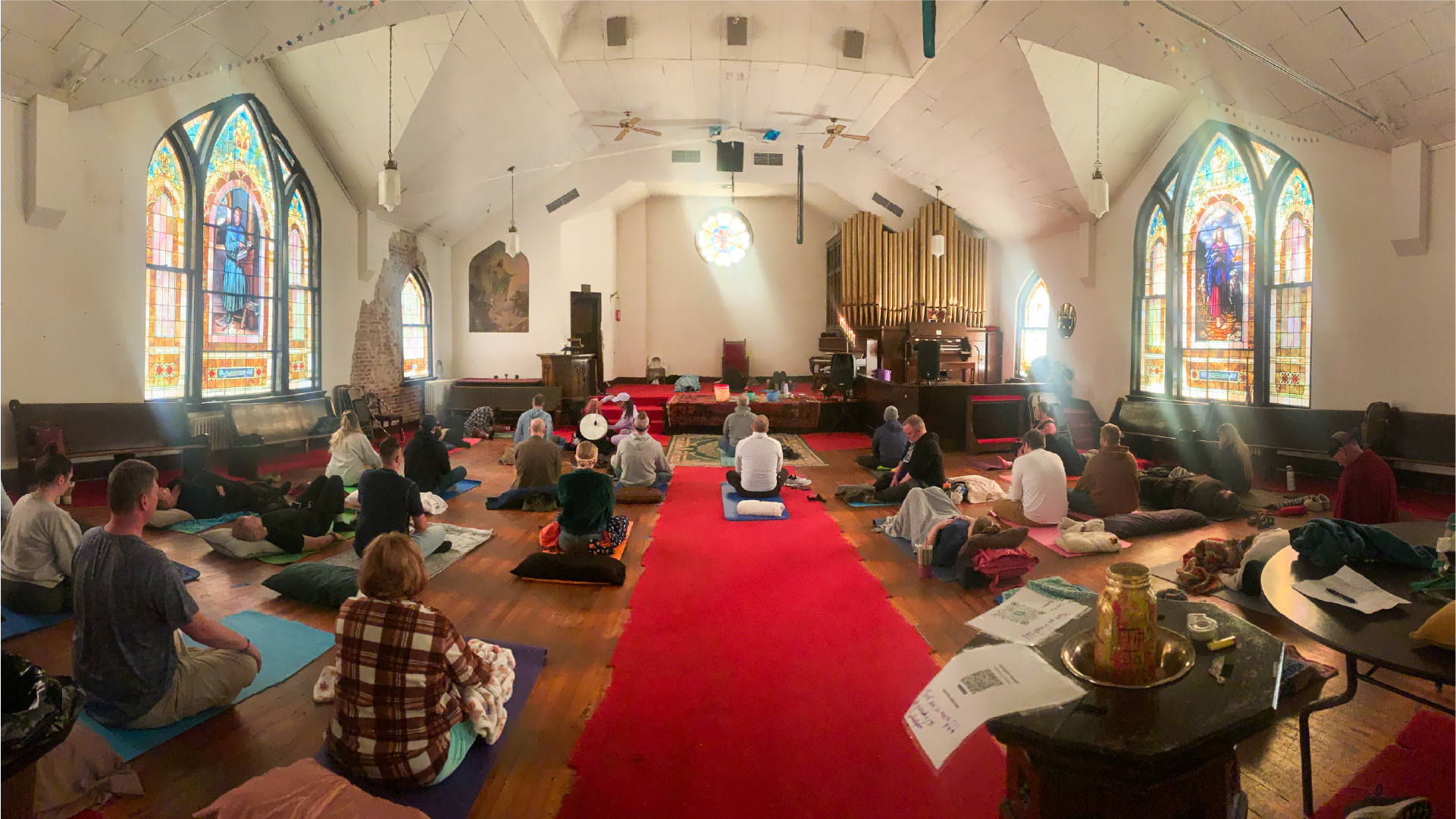 Image of people participating in a group sound bath.