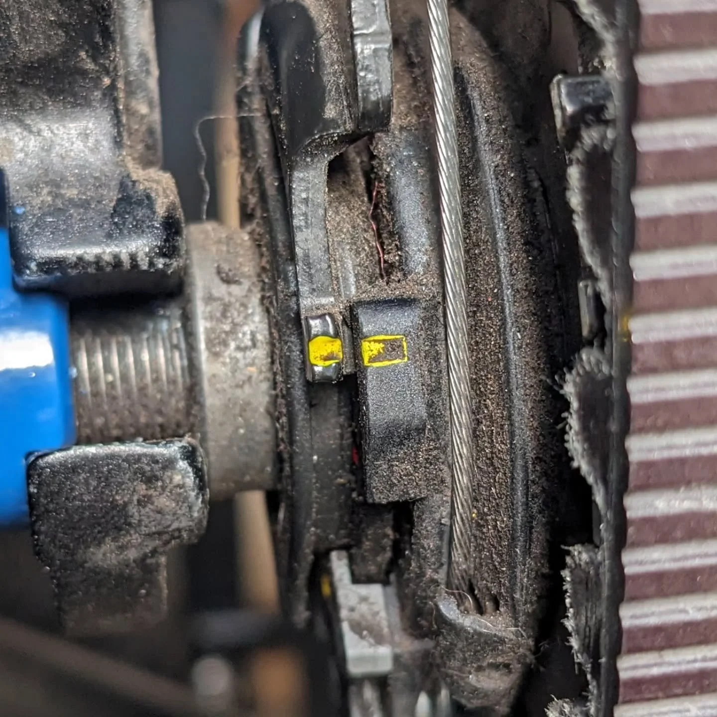 You see these two little yellow marks? Things like this are why we at Ansons are big fans of Shimano, especially their older, simpler, more stable product lines.

Those two little yellow reference marks on this Nexus rear hub are stamped and painted 