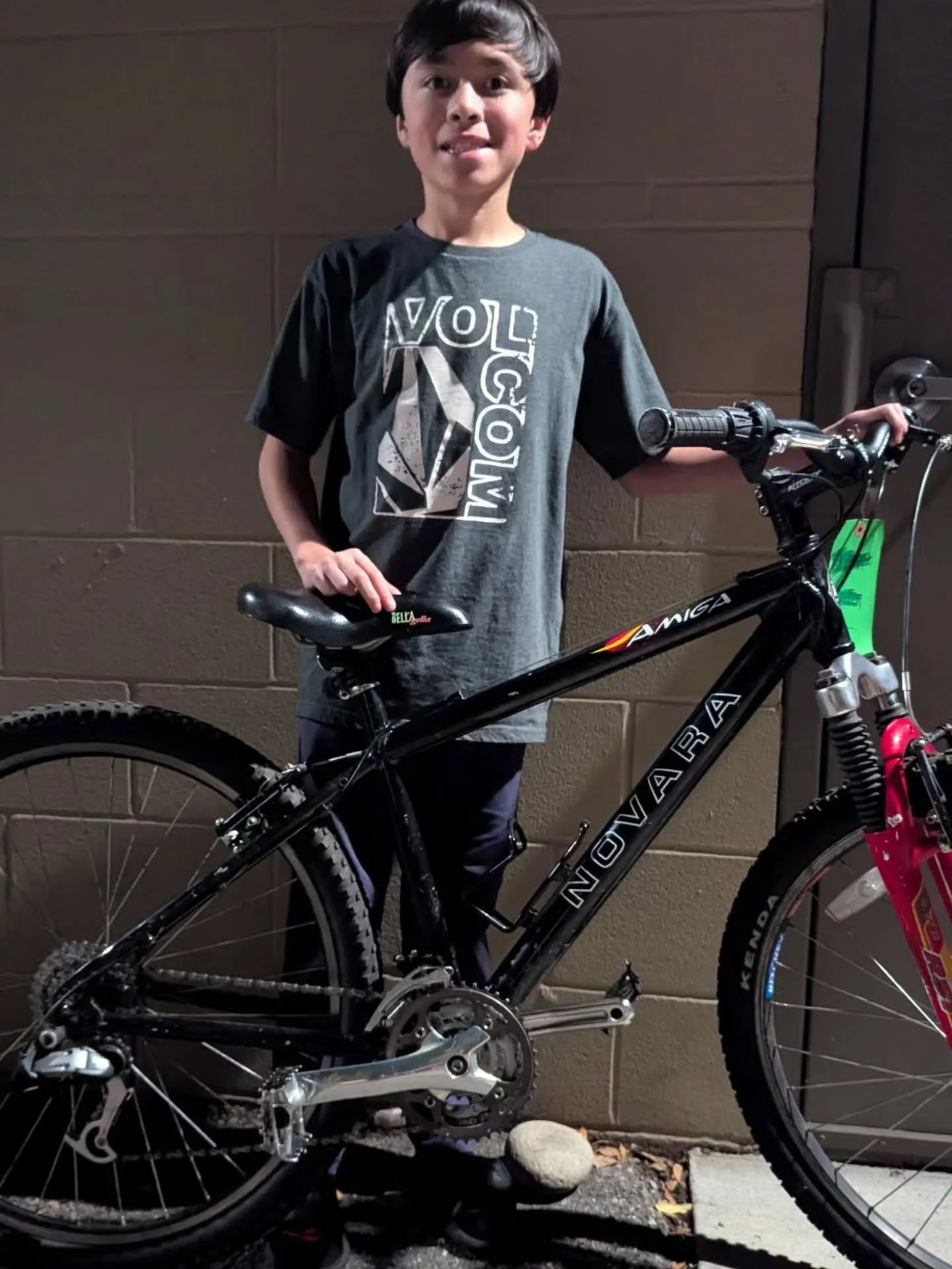 New bike day! He's an after school bike club member who was struggling along on a bike two sizes too small. Thanks to the kind donation from @christagi he now has a nice, clean Novarra in a size he can grow on. Biking around town will be so much more