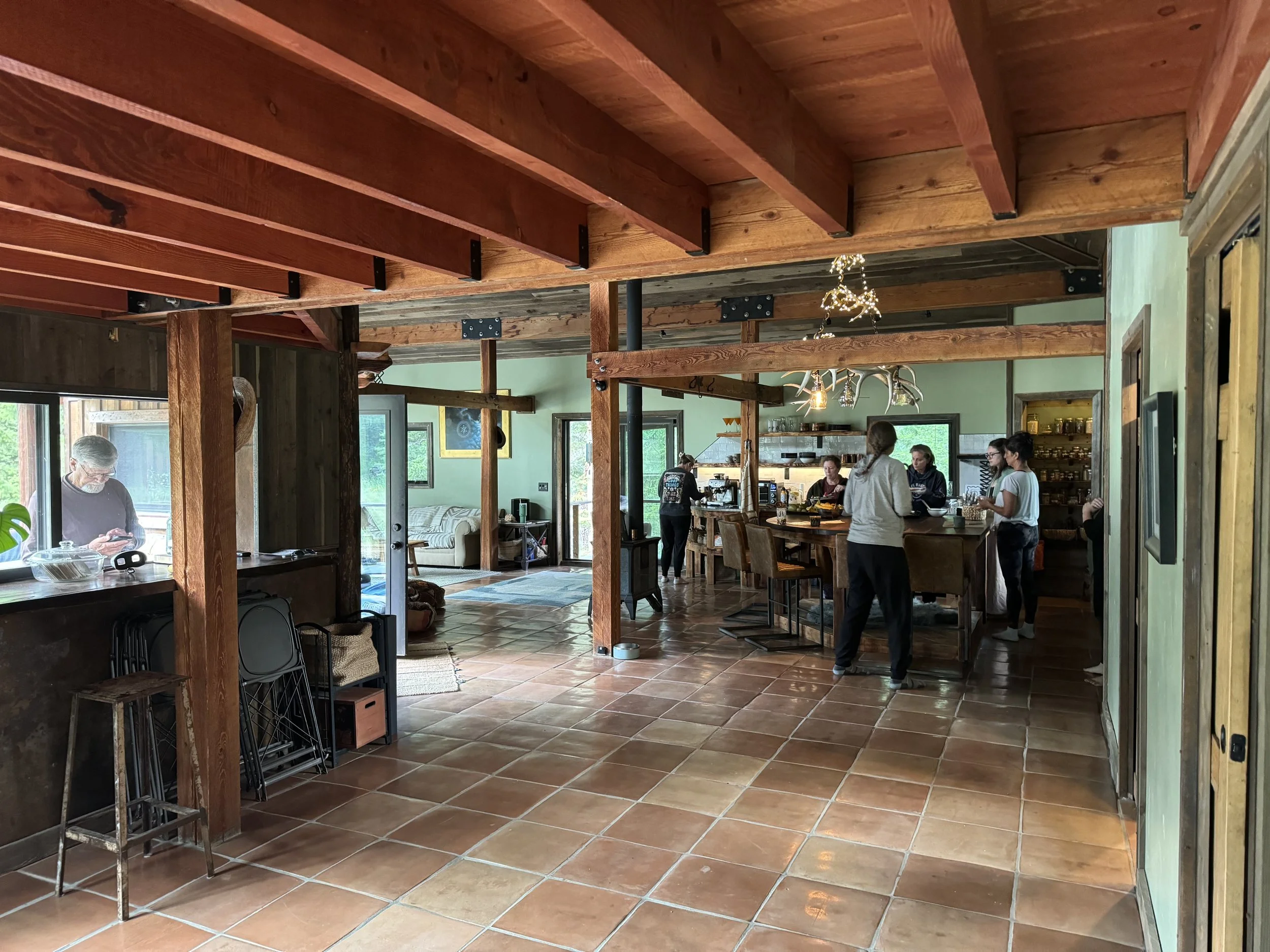 Many people gathering at the lodge in community.