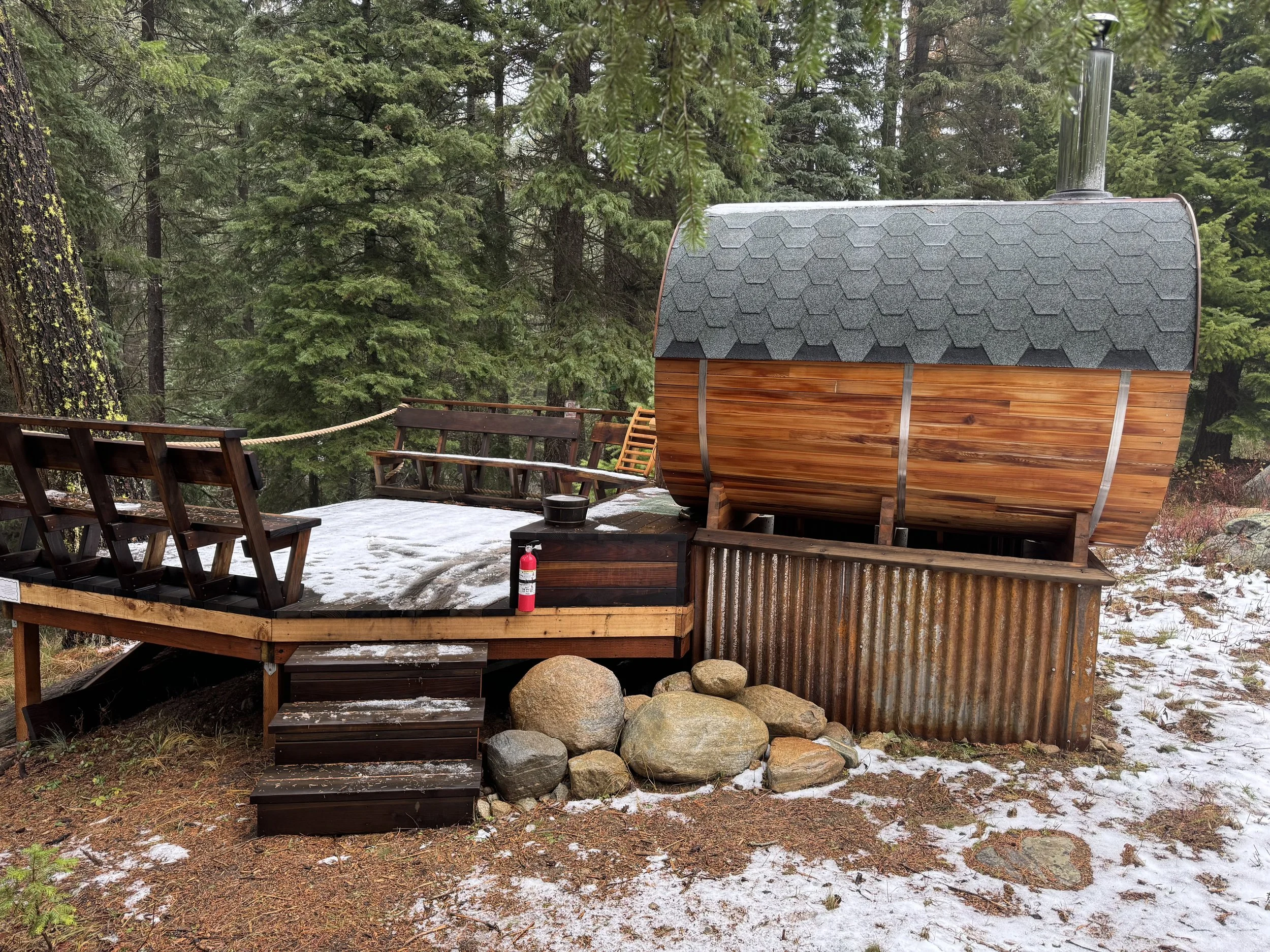 Cedar wood fired sauna seats up to eight and is used in winter and throughout the year.