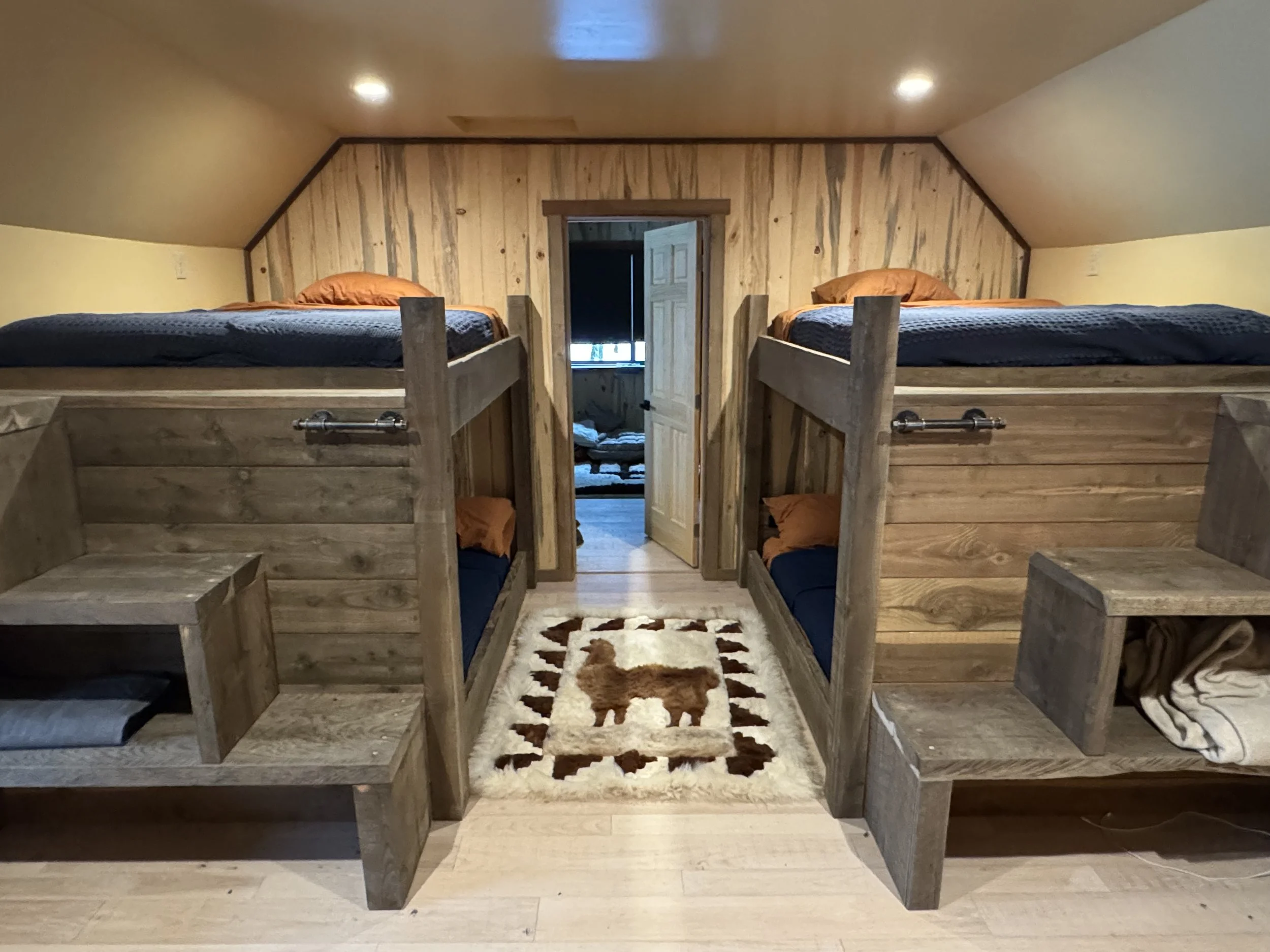 Bunk room in the barn with comfortable full size-beds top and bottom.