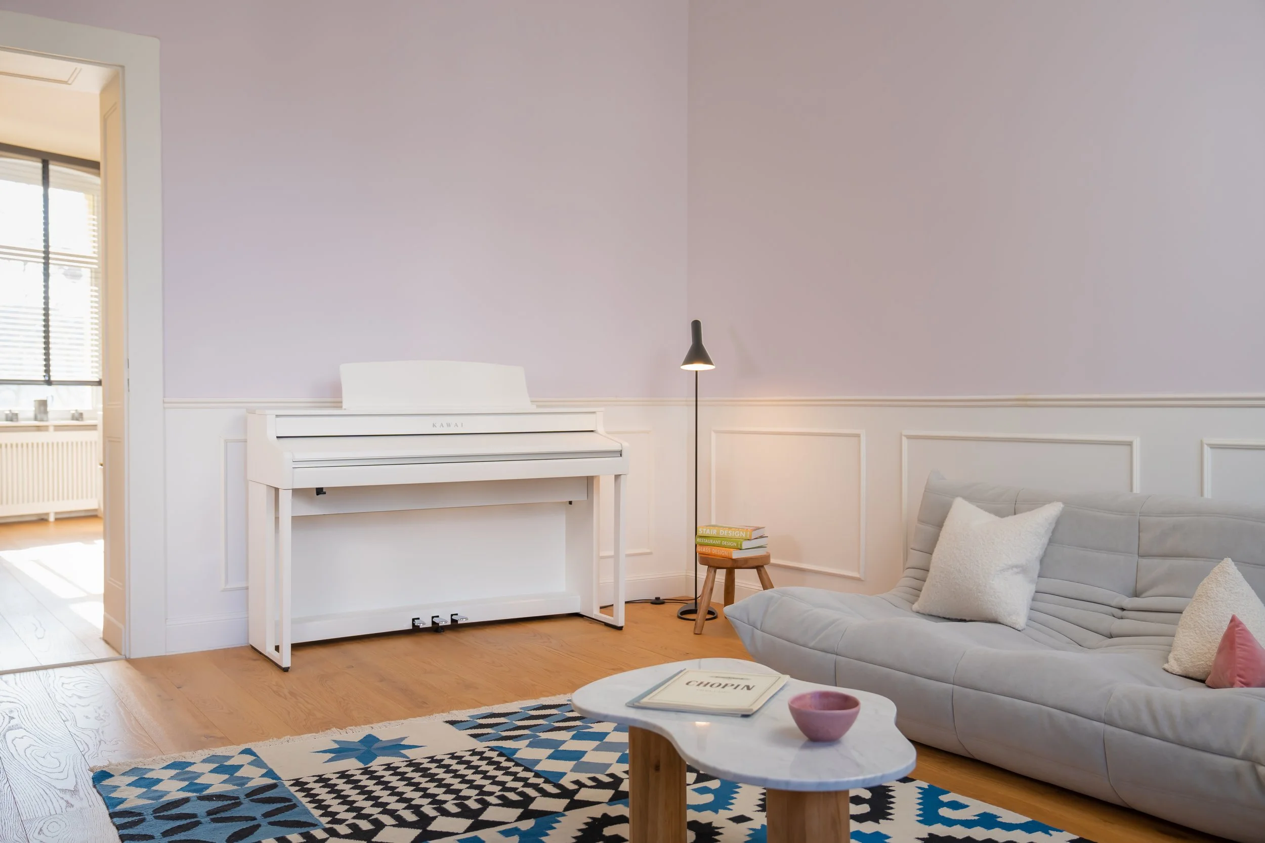 Kawai CA501 Digital Piano  in warm colored living room 