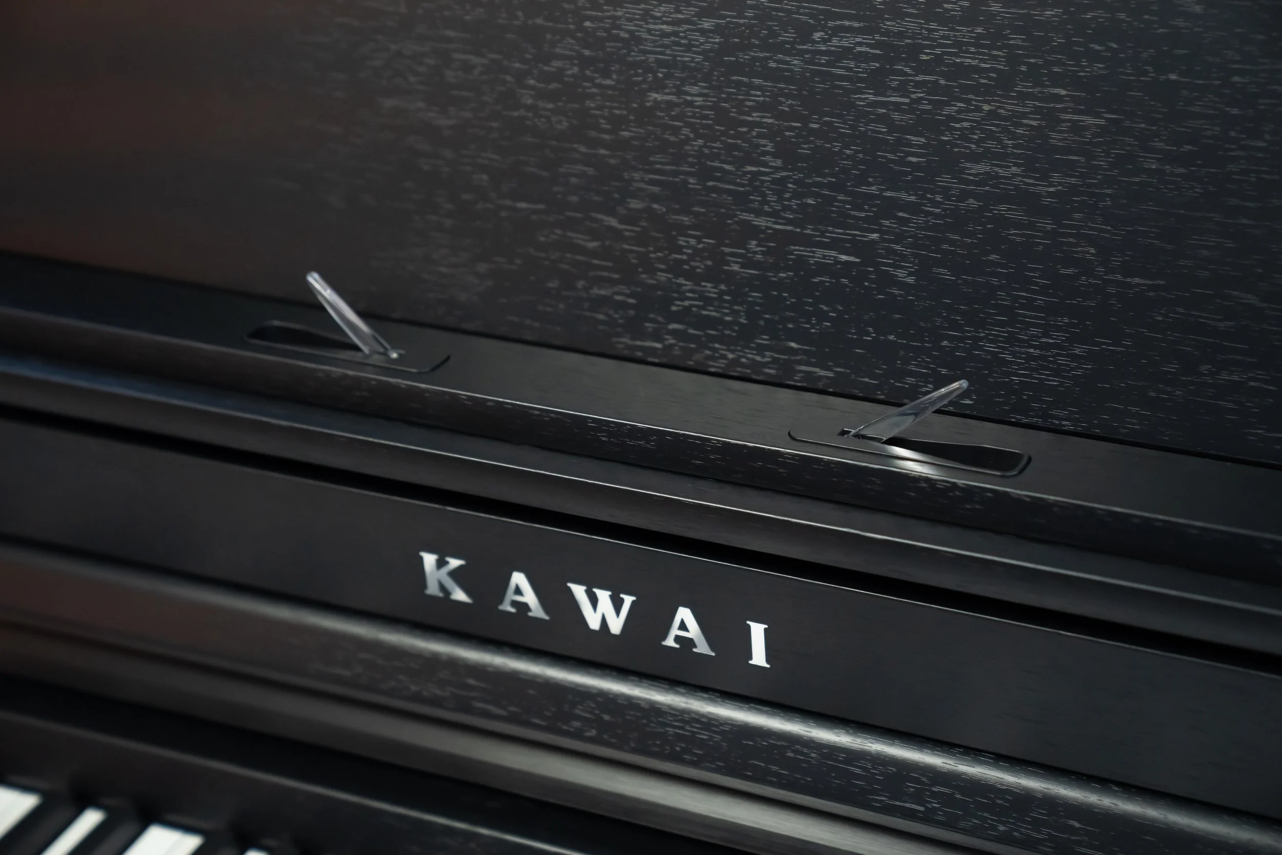 KAWAI logo above keys on KAWAI CA401