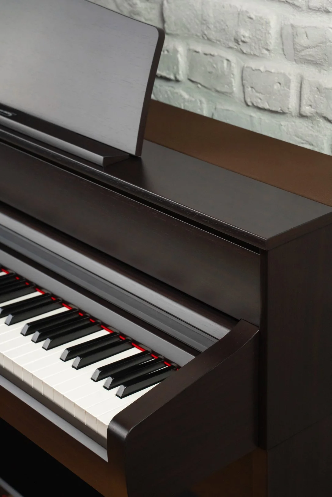 Kawai CA701 Digital Piano side view of cabinet showing keys
