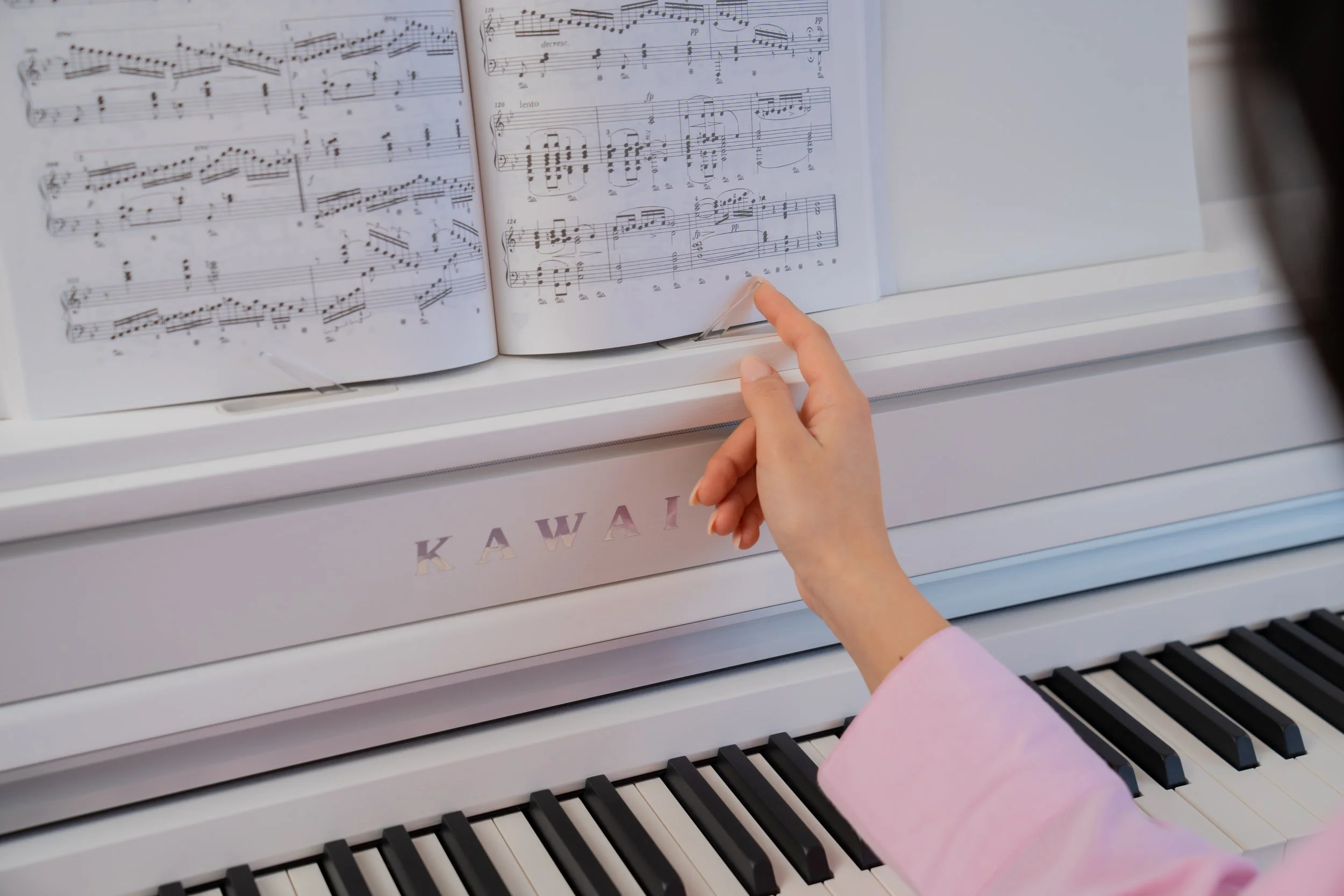 Sheet music sitting on Kawai CA501 Digital Piano 