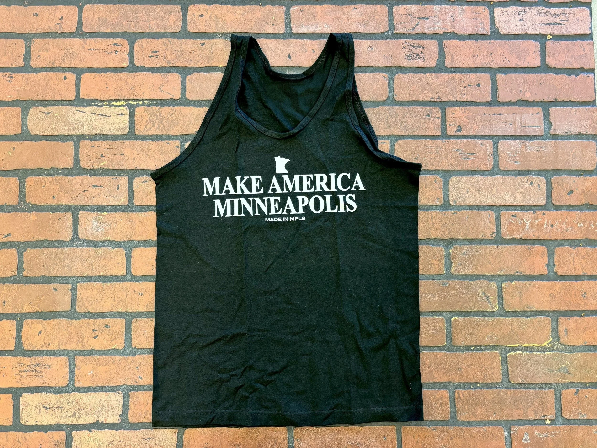 Unisex black tank top that says "Make America Minneapolis" in white print