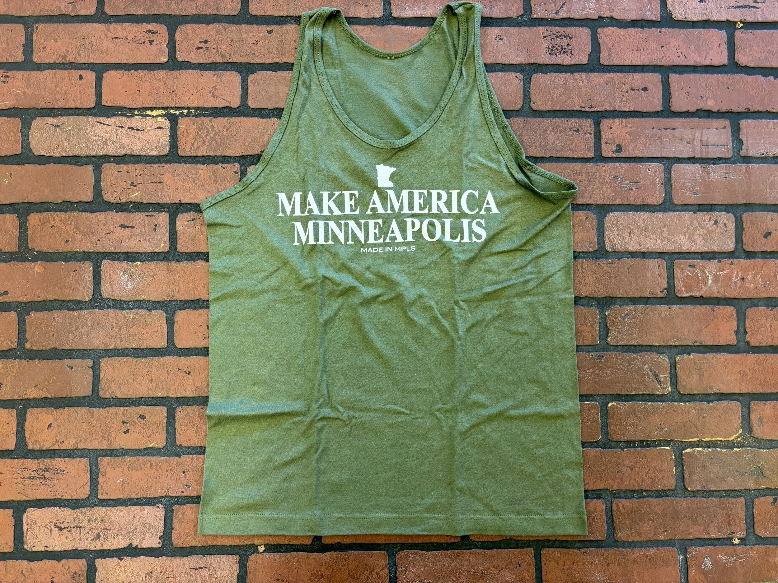 Unisex Army green tank top that says "Make America Minneapolis" in white print