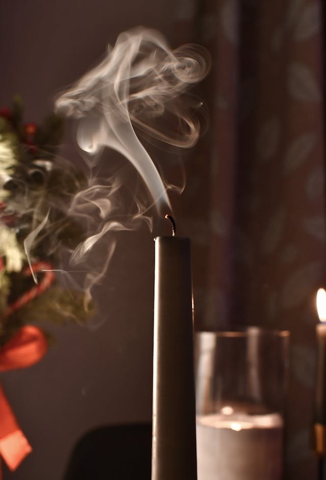smoke coming from a snuffed candle