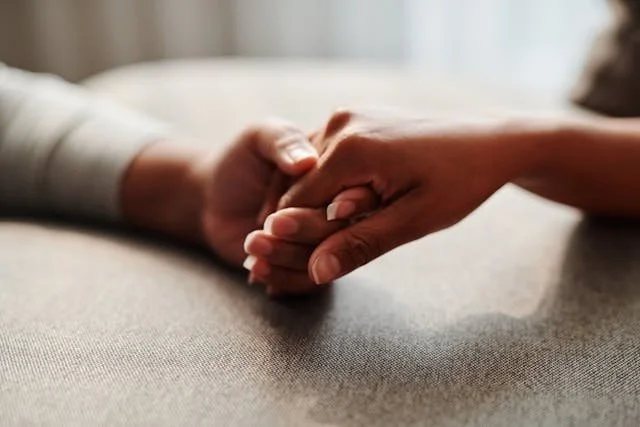 two interlaced hands