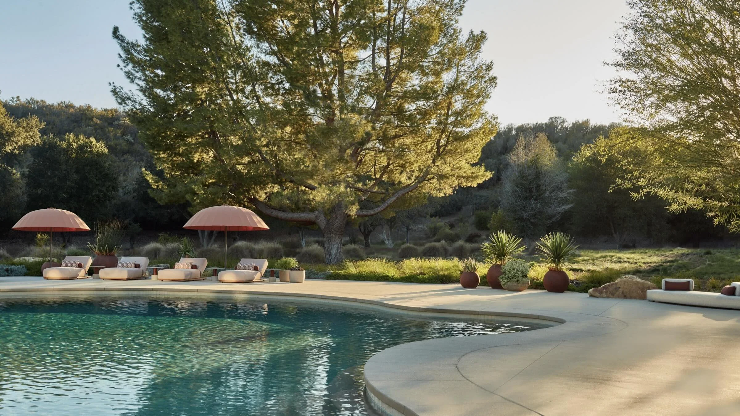 HL 193-paola-lenti-bistro-parasol-umbrella-meridiani-air-claud-relax-lounge-bed-lounge-will-smith-landscape-design-former-estate-luxury-pool-design-calabasas.jpeg