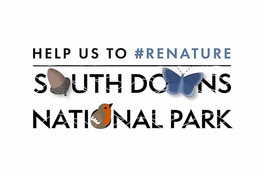 Text urging help to restore South Downs National Park, with butterfly and birds