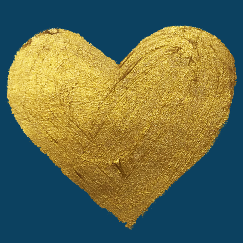 A heart-shaped object covered in gold-colored textured material against a dark blue background.