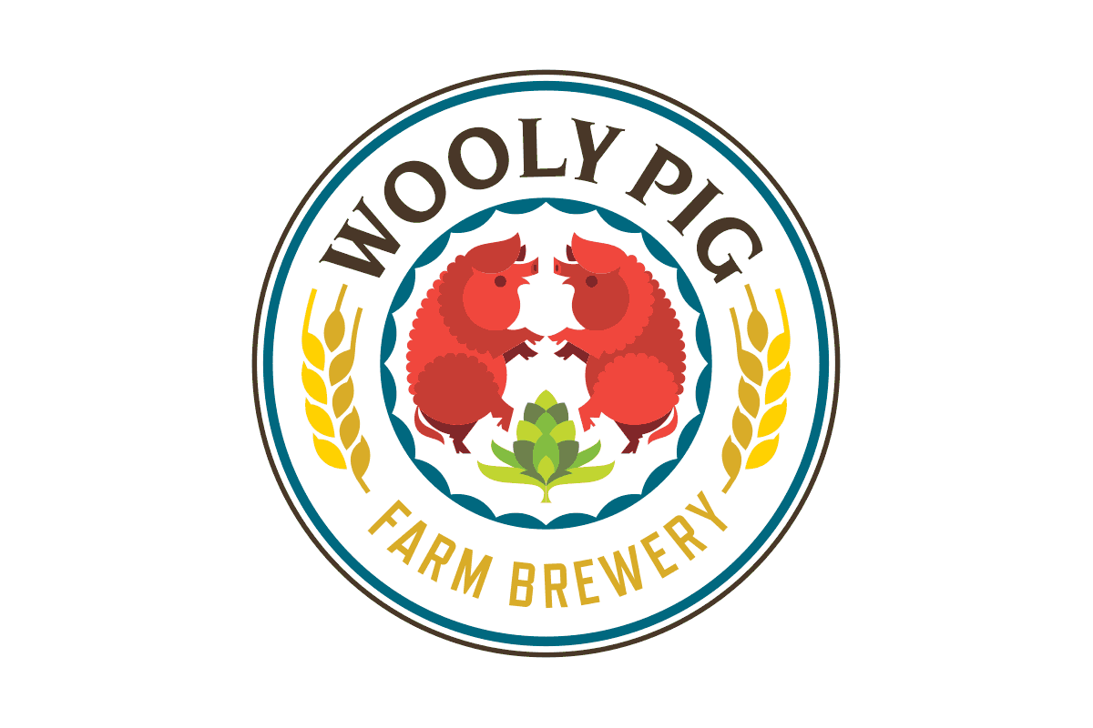 Logo of Wooly Pig Farm Brewery featuring two red pigs facing each other with their snouts touching, surrounded by a decorative circular border with yellow wheat stalks.