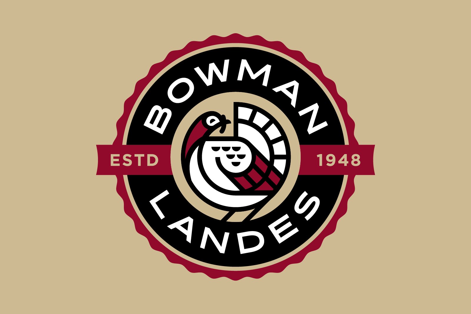 A circular logo for Bowman Lands, established in 1948, featuring a stylized bird with a beak, wings, and tail in black, white, beige, and maroon colors, with the text 'BOWMAN LANDS' and 'ESTD 1948' on a maroon banner.