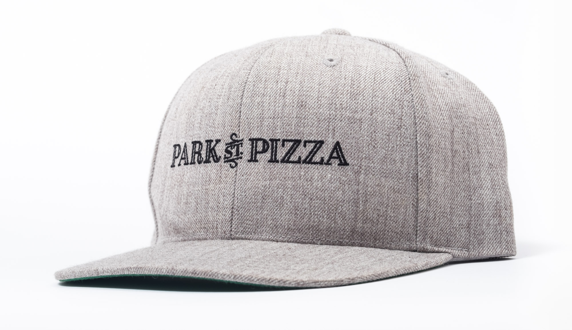 Gray baseball cap with black embroidered text 'PARK ST PIZZA' on the front, against a white background.