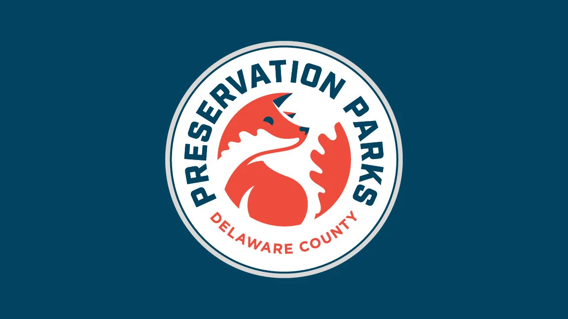 Logo of the Preservation Parks of Delaware County, featuring a red fox inside a circular emblem.