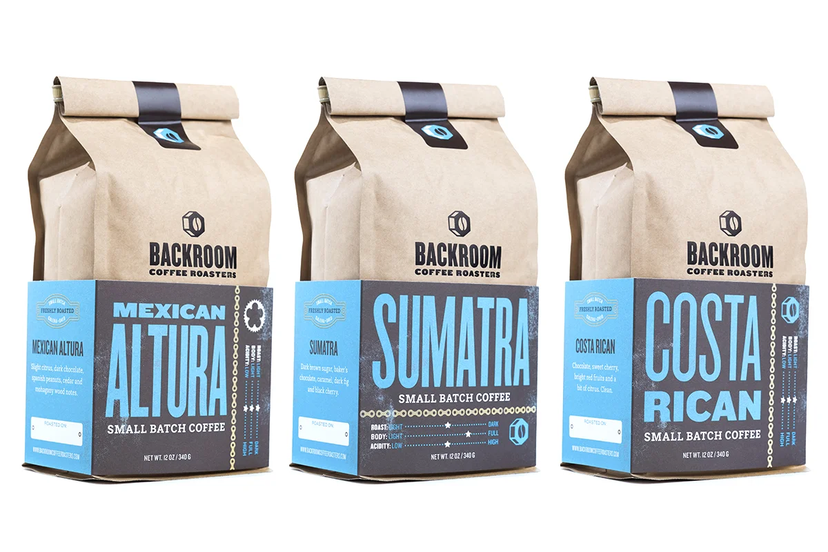 Three bags of Backroom Coffee Roasters small batch coffee, labeled Mexican Altura, Sumatra, and Costa Rican