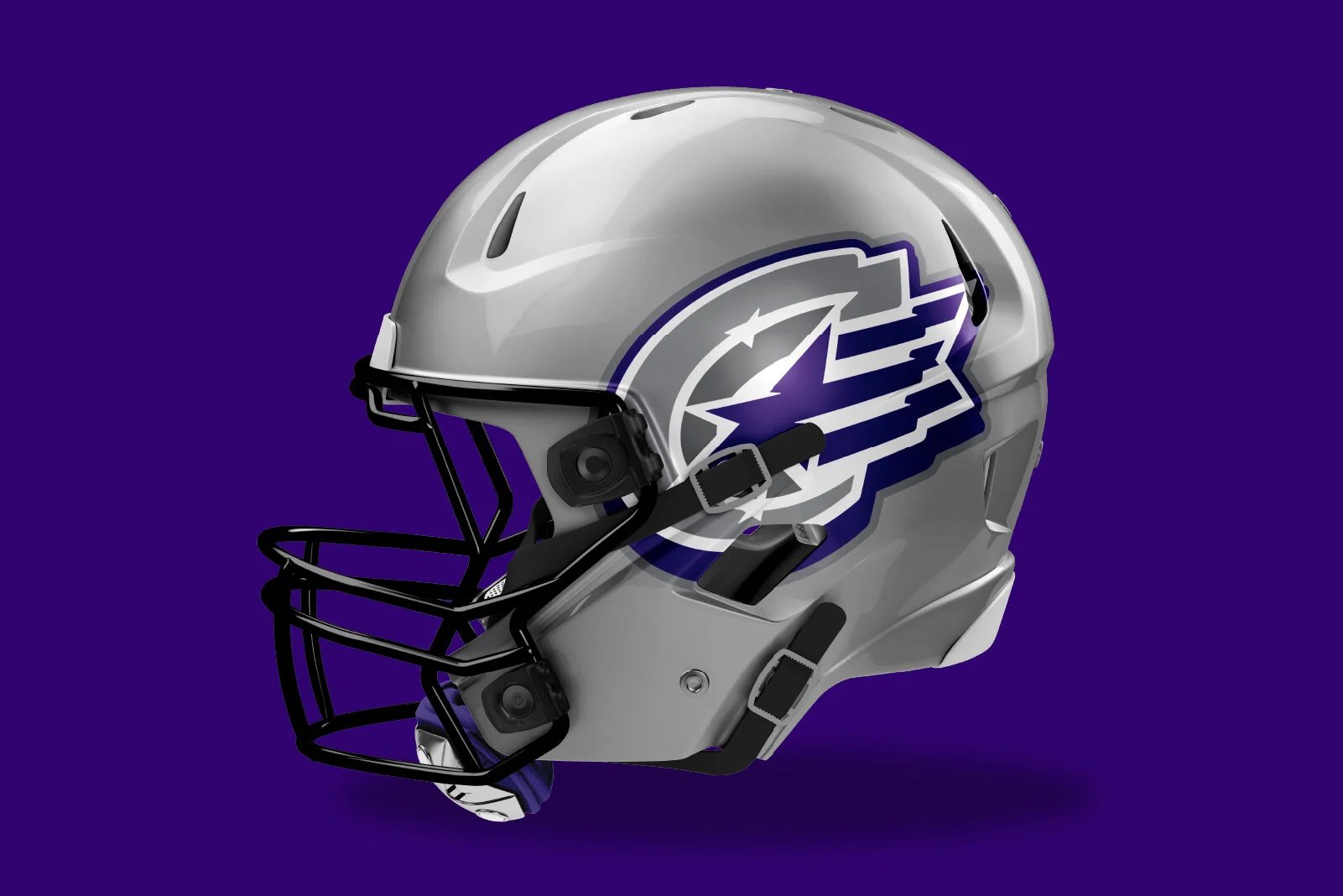 Silver football helmet with a black faceguard, featuring a purple and white team logo on the side, set against a purple background.