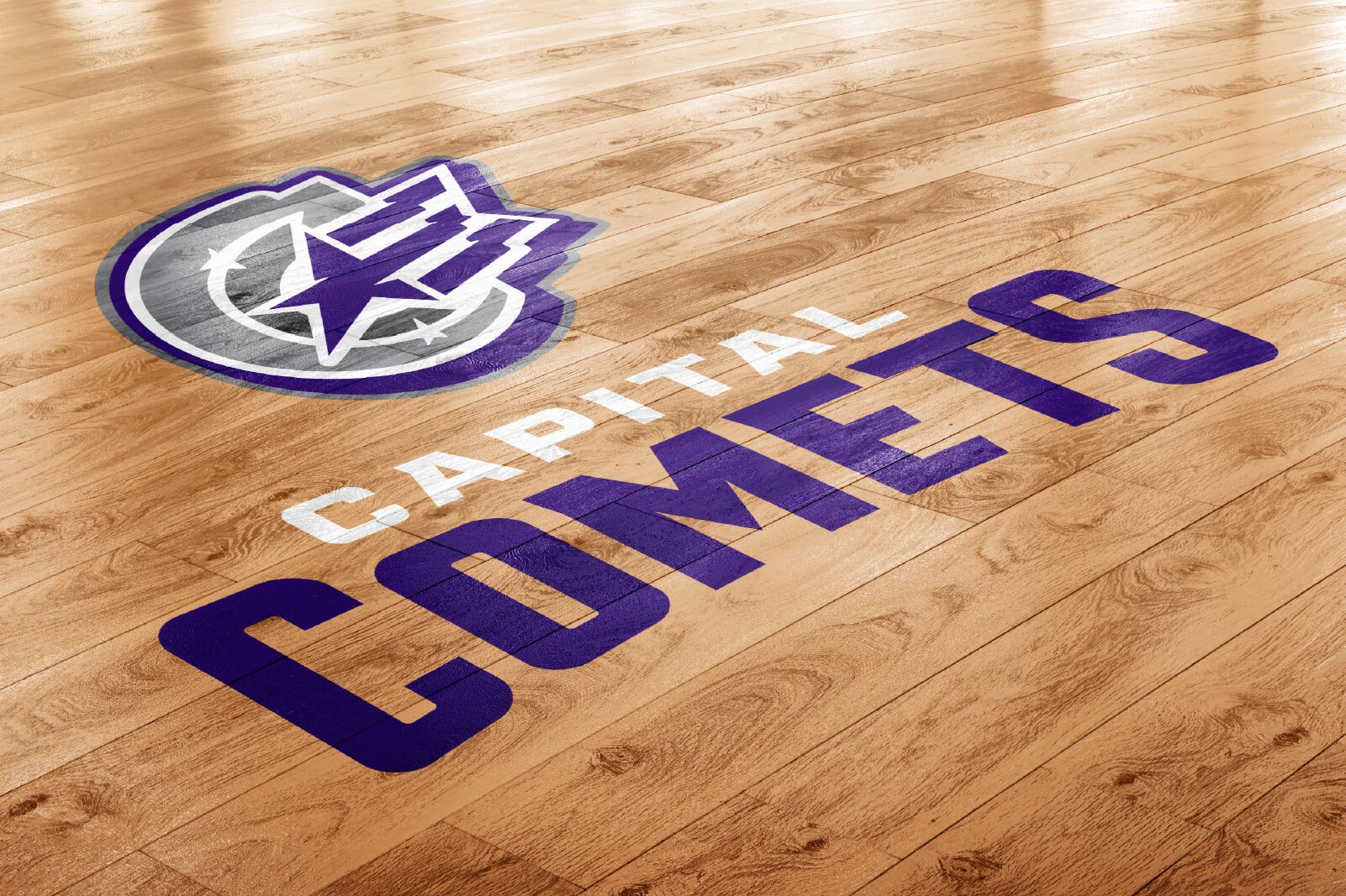 The Dallas Stars logo and team name painted on a wooden basketball court floor.