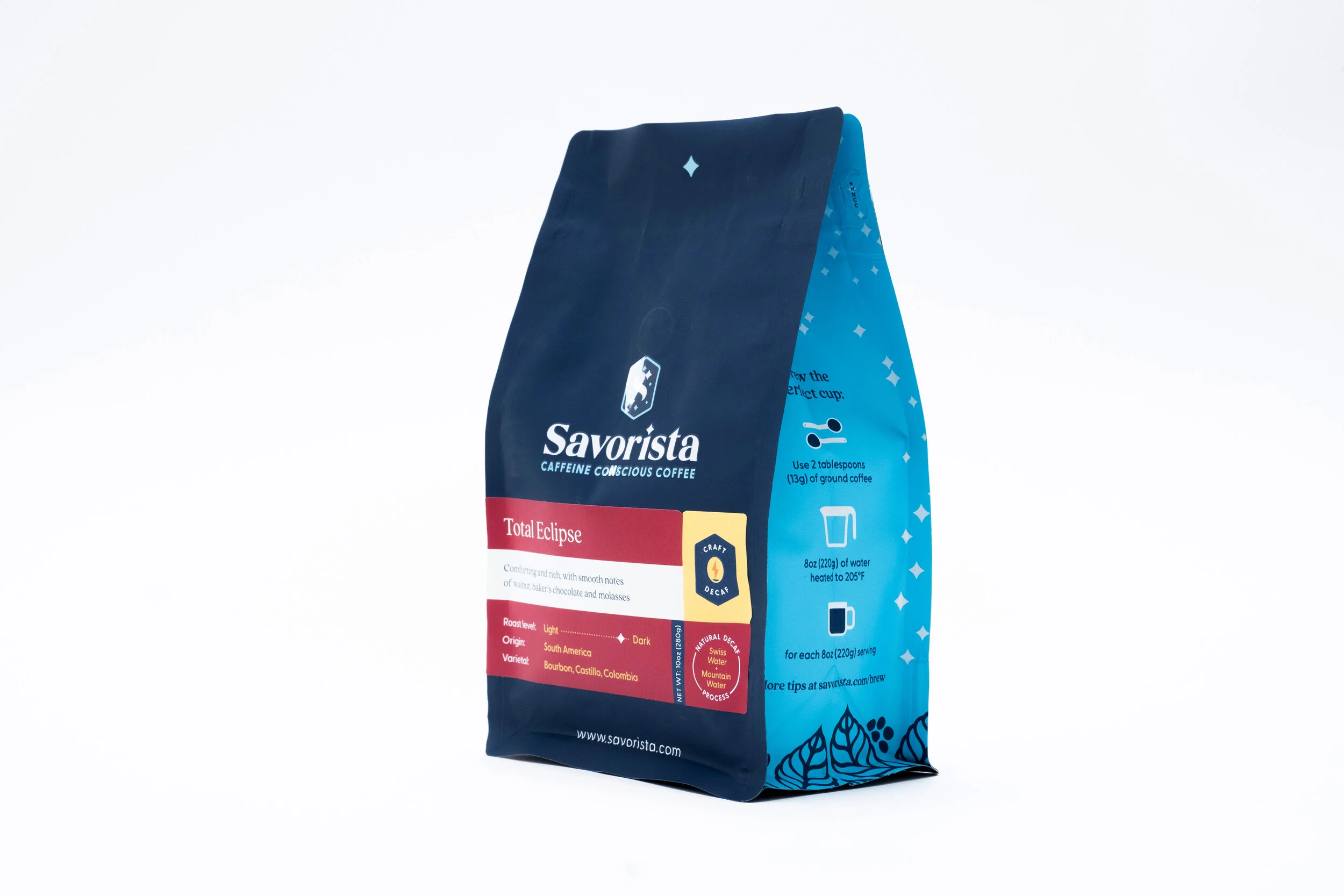 A bag of Savorista Total Eclipse coffee with blue and red packaging, showing brewing instructions and coffee details on the side.