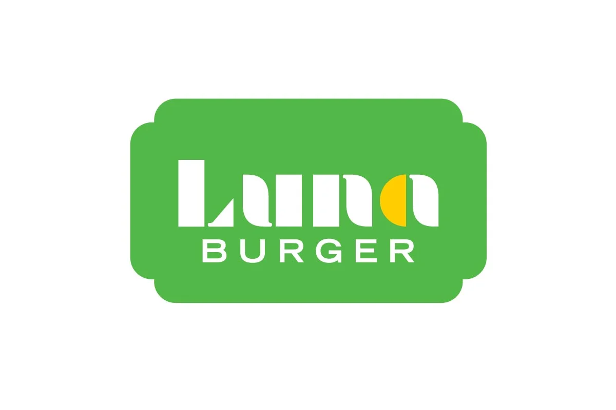 Logo of a burger restaurant with a green background and stylized text that reads 'Luna Burger' with a yellow accent in the letter 'u'.