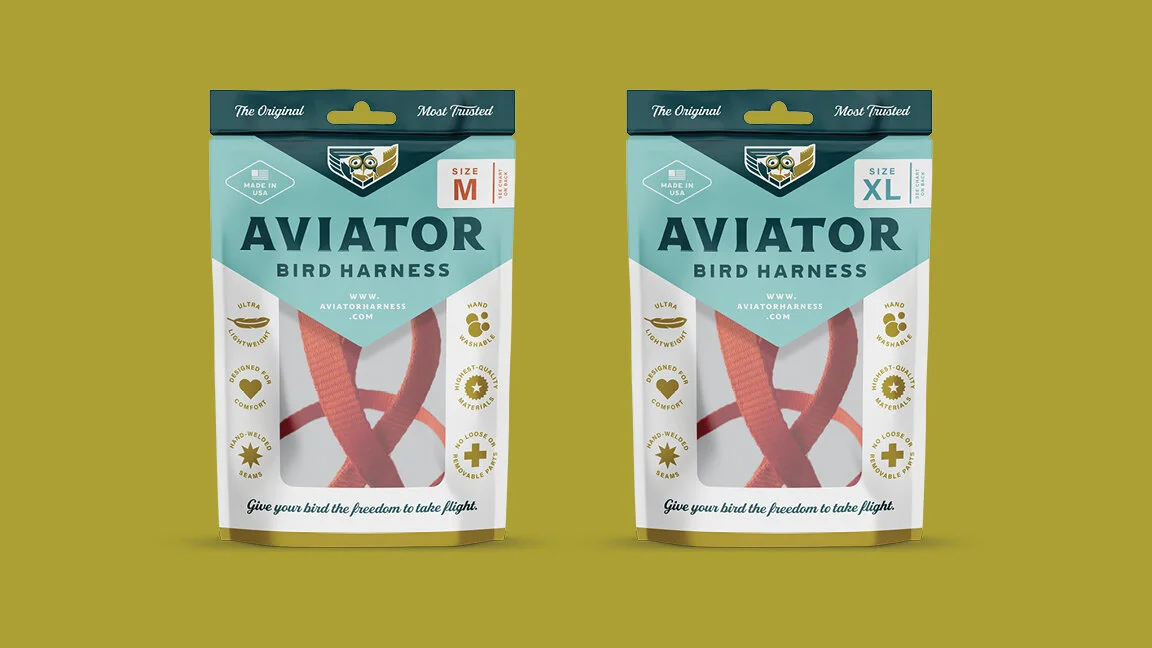 Packages of Aviator bird harnesses in medium and extra large sizes, displayed side by side on a yellow background.