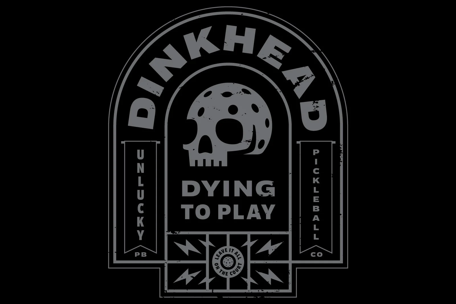 A black and gray graphic design featuring a skull with ice cream cone texture, the text "DUNK THE ADD" curved around the top, "DYING TO PLAY" below the skull, and satellite-style symbols at the bottom with the phrase "LEAVE IT ALL ON THE COURT." Two 