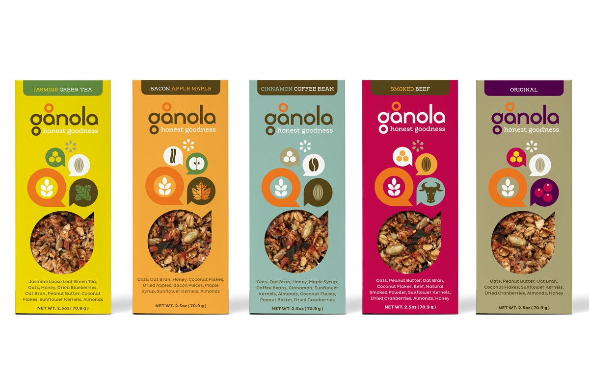 Five packages of granola with different flavors: jasmine green tea, bacon apple maple, cinnamon coffee bean, smoked beef, and original, each containing granola in clear plastic windows.
