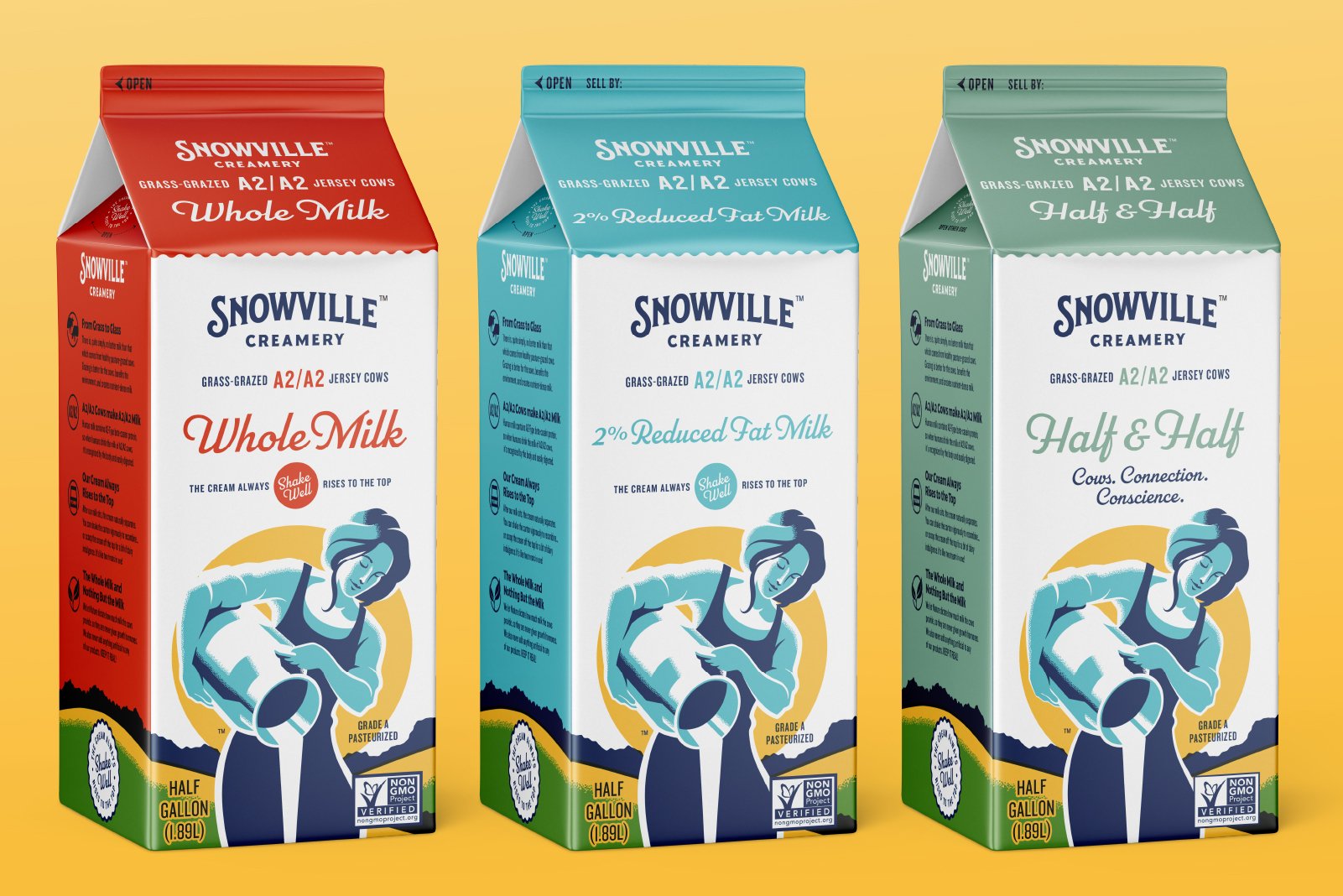 Three cartons of Snowville Creamery milk in different varieties: Whole Milk, 2% Reduced Fat Milk, and Half & Half, displaying colorful packaging with an illustration of a woman pouring milk.