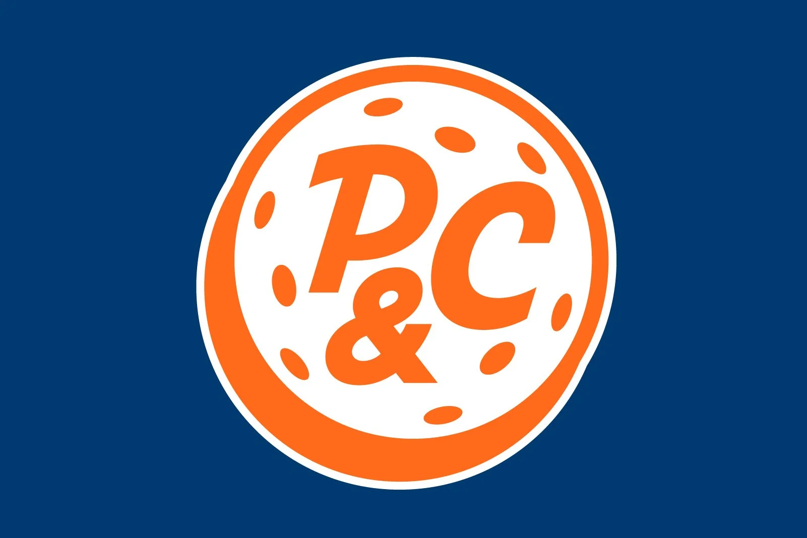 Logo with orange circle representing a cookie, with the text 'P C & C' in orange inside, on a dark blue background.