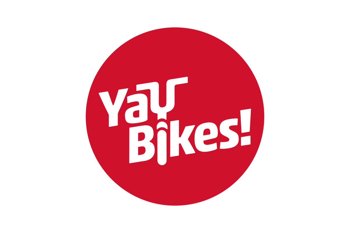 Red circular logo with white stylized text that says 'Yau Bikes!'.