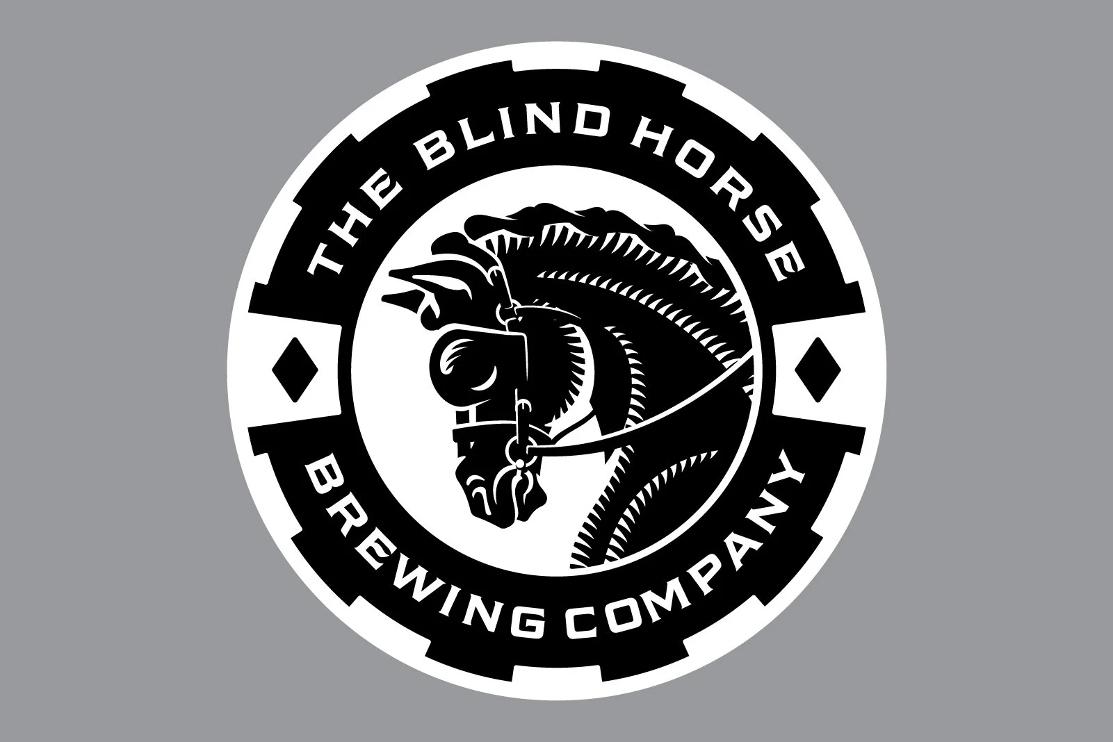 Black and white circular logo with a dragon wearing sunglasses and a hat. Text around the circle reads 'The Blind Horse Brewing Company.'