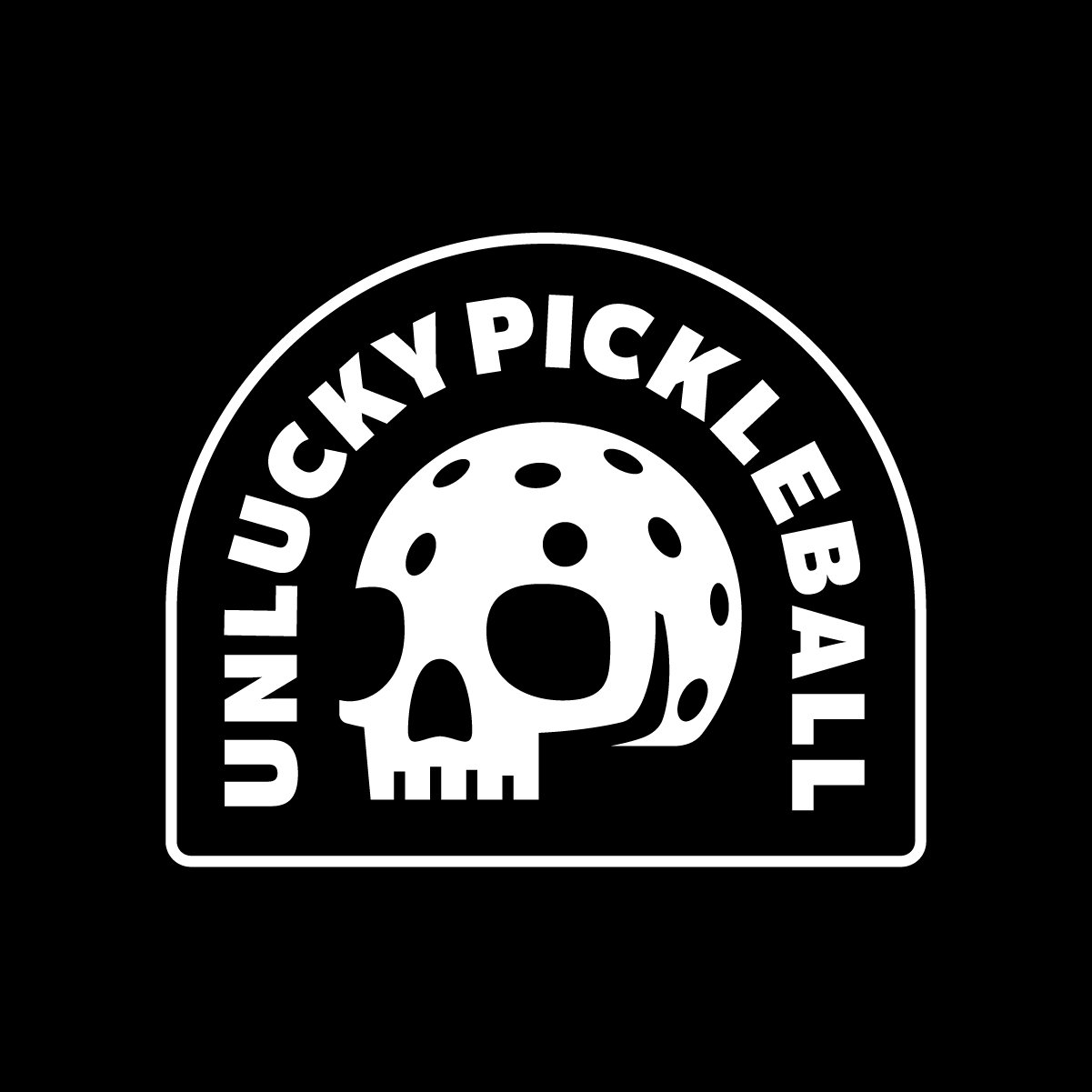 Black and white logo with a skull-shaped cookie in the center, surrounded by the words 'Lucky Nucky Pickleball' in a circular arc.