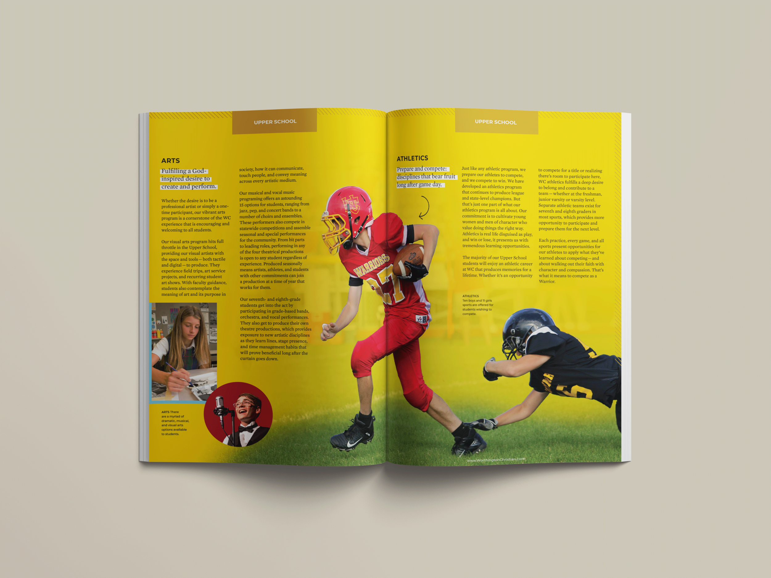 An open school magazine featuring a large photo of two young football players, one in a red jersey and the other in a black jersey, on a field. The magazine pages have yellow backgrounds with text, and sections titled "Arts" and "Athletics." The left
