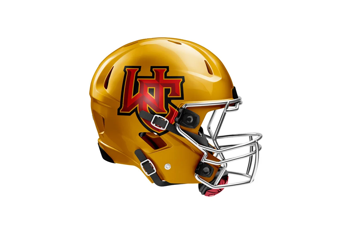 A gold football helmet with a red and black logo on the side.