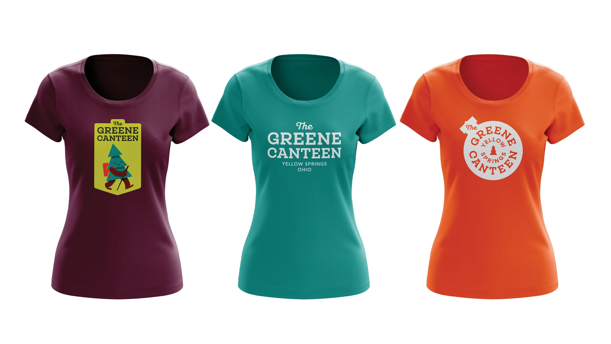 Three women's T-shirts in purple, teal, and orange with 'The Greene Canteen' logos in yellow, white, and red, respectively.