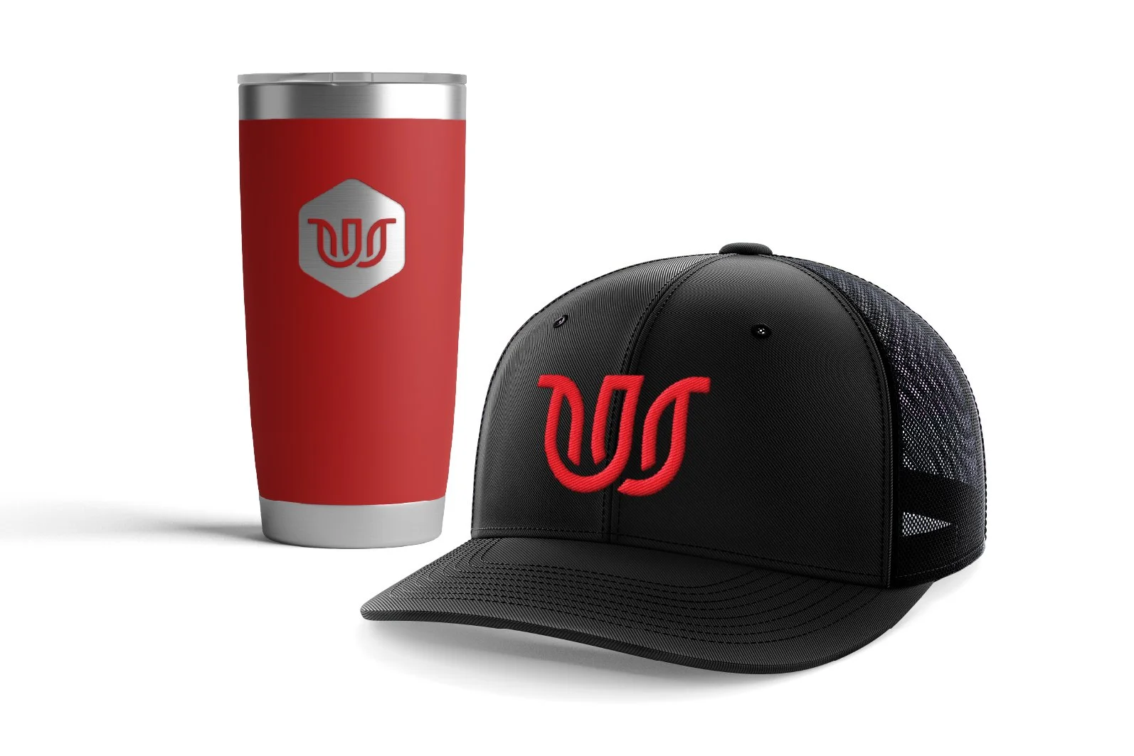 A black trucker hat with a red logo, a red tumbler with a silver logo, both displaying the same logo.