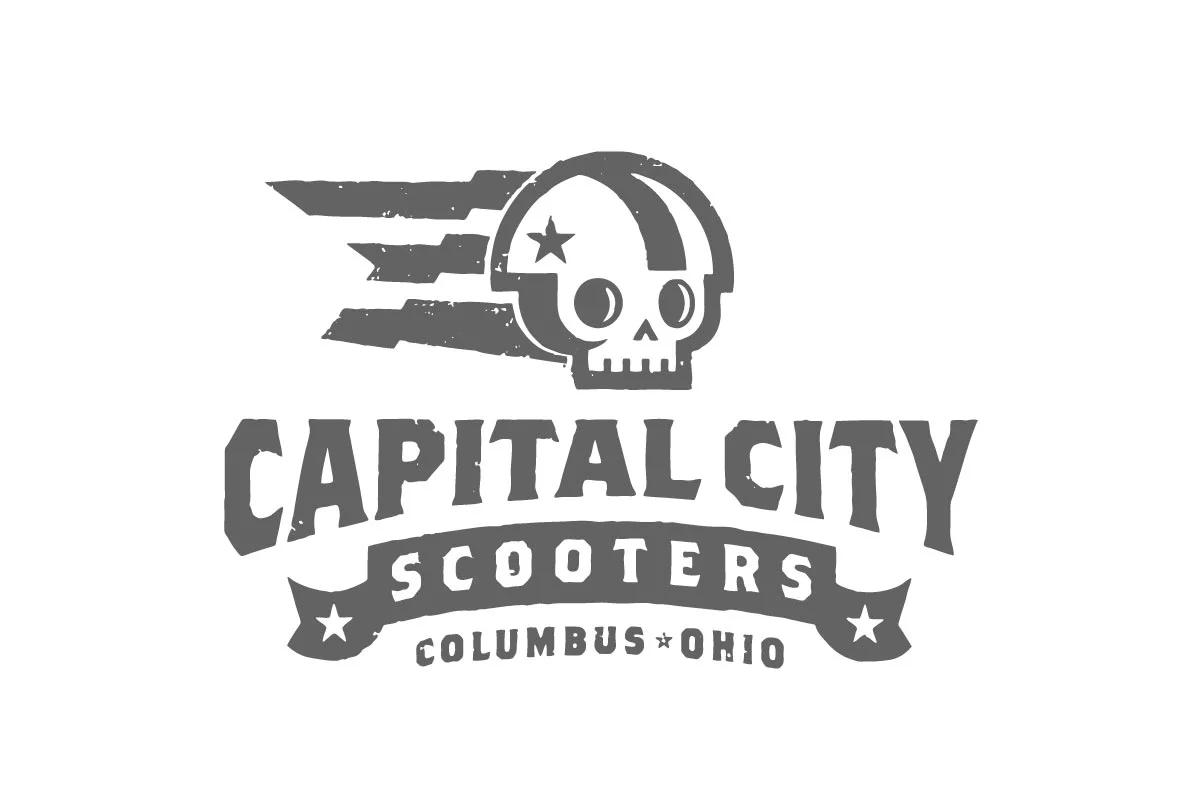 Logo for Capital City Scooters in Columbus, Ohio featuring a skull with a star and stripes.