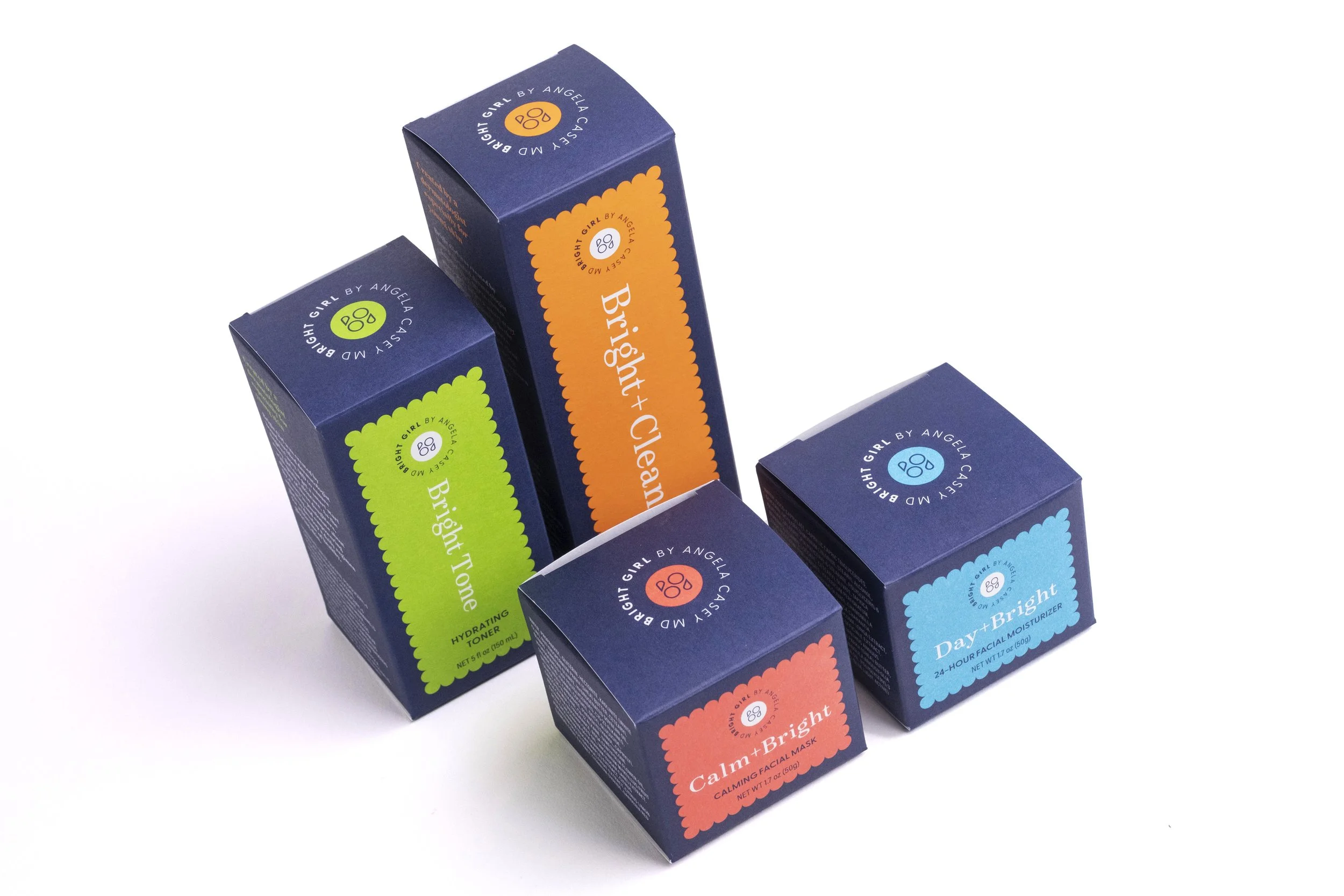 A collection of colorful boxed skincare products, including facial masks and moisturizers, arranged on a white background.