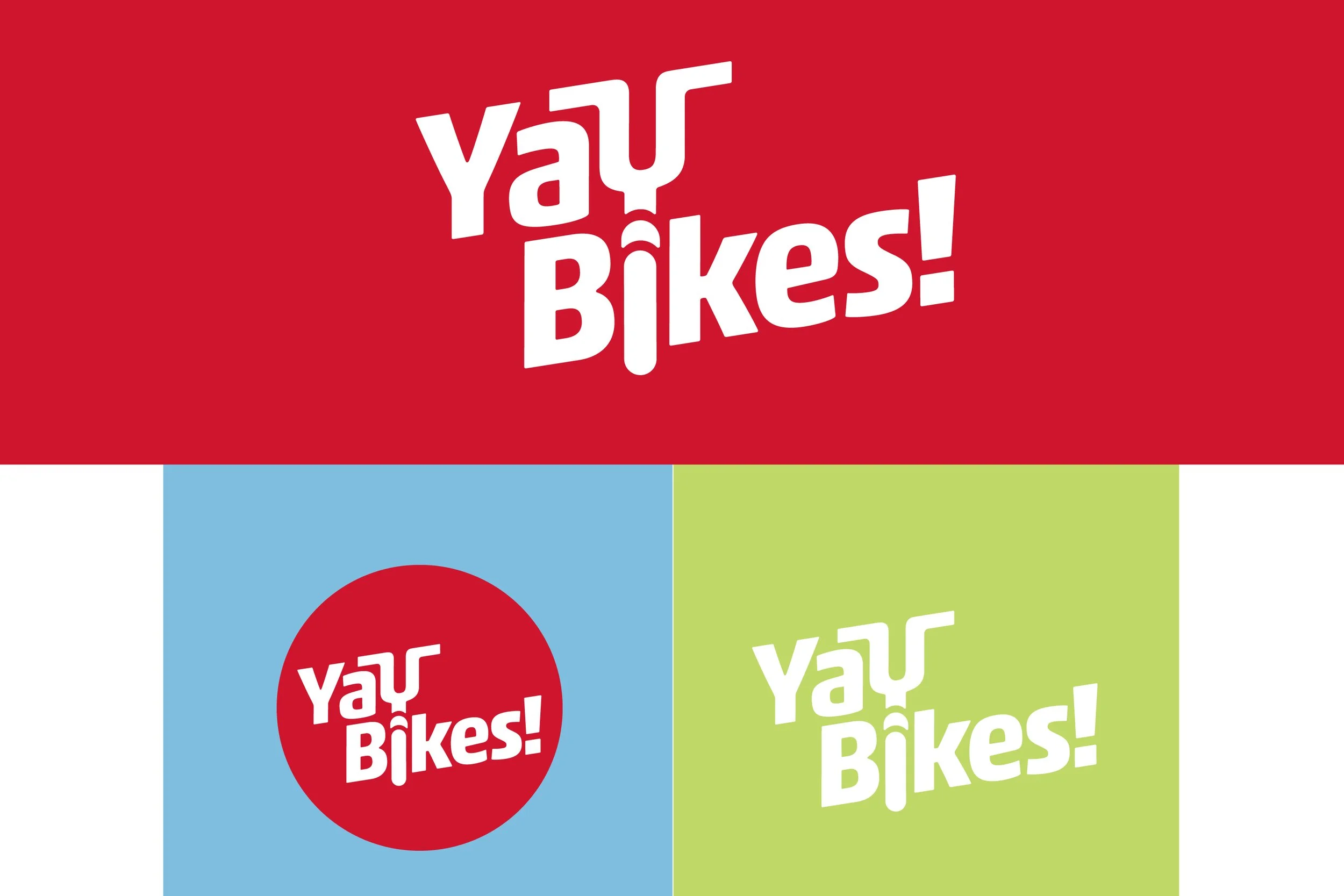 Colorful signs with the phrase "Yay Bikes!" in bold white text on a red, blue, and green background.