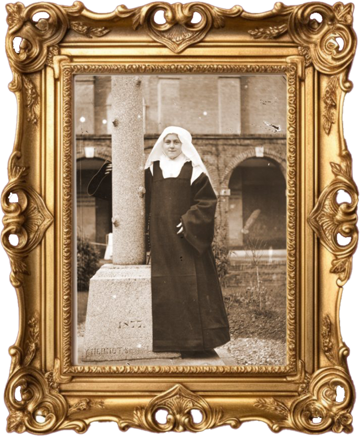 Image of St. Theresa framed with an ornate, gold-colored decorative frame.