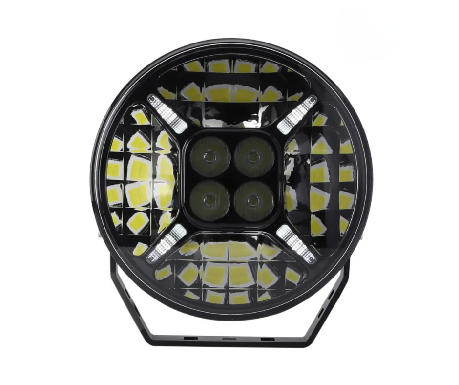 A circular LED light with multiple yellow diodes inside, arranged in a geometric pattern, and four smaller circular lights in the center.