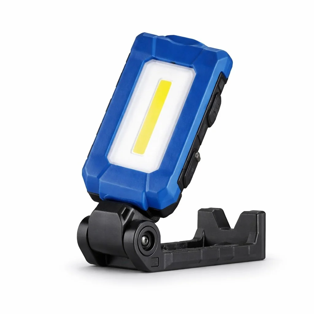 A portable LED work light with a blue and black casing, mounted on a black adjustable stand.