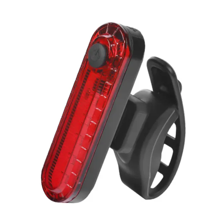 A bicycle taillight with a red LED light and a black mounting clip.