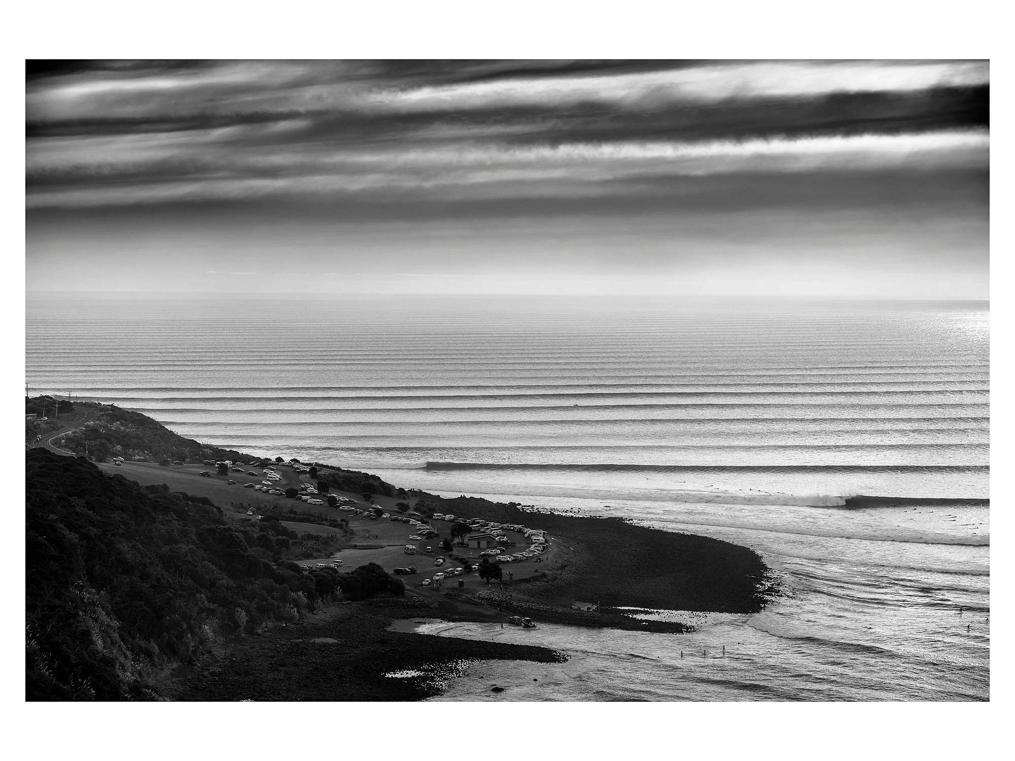 Corduroy at Manu Bay

Black and white lines stacked to the horizon. The iconic Manu Bay headland stands firm as massive, rhythmic swell marches toward the coast in a display of raw energy. Captured in Raglan, NZ.

Limited Edition Fine Art Print. Clic